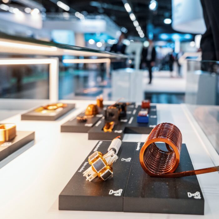 Copper coil and electronic components on a display stand