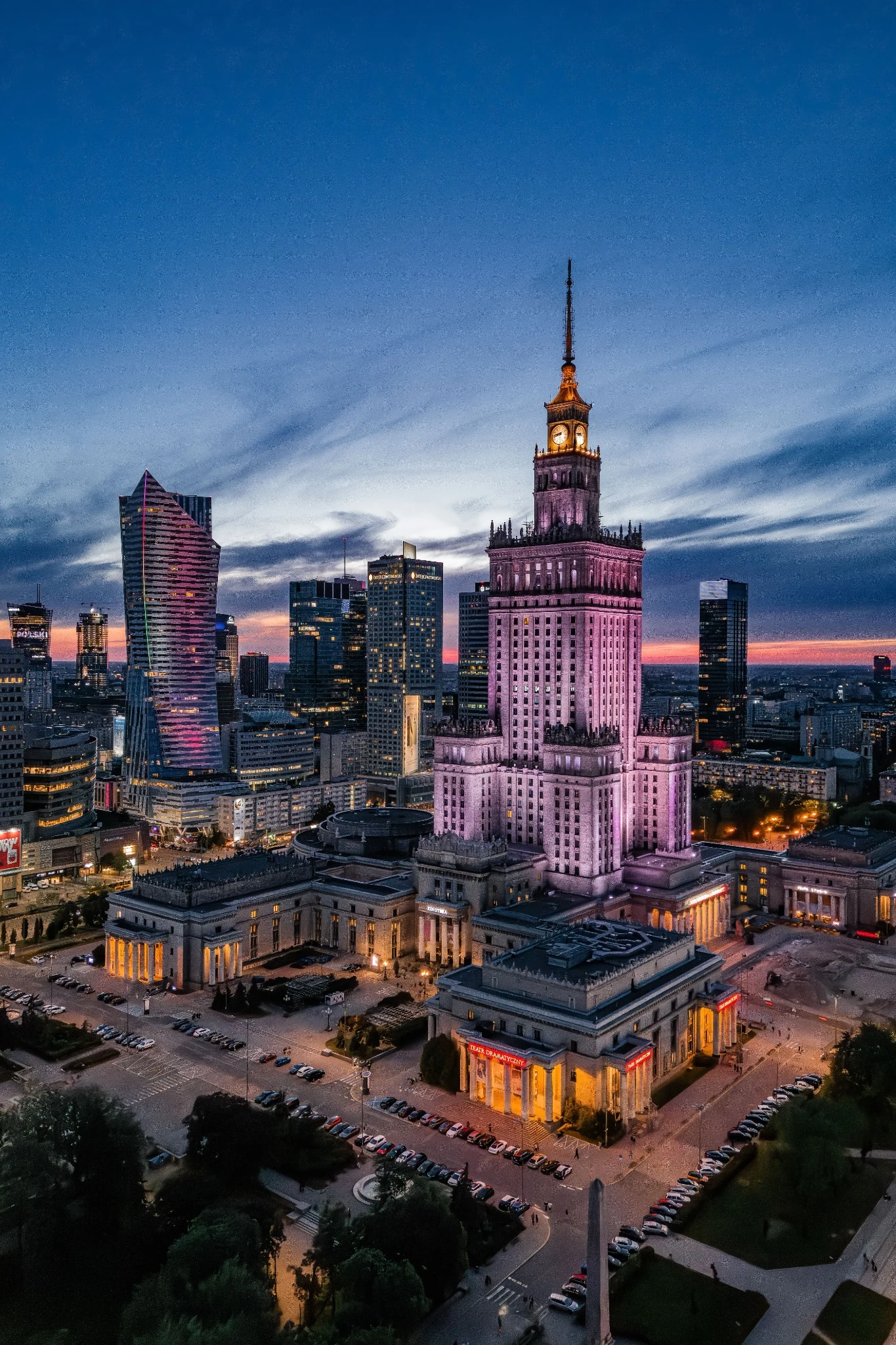 Warsaw skyline illuminated at dusk